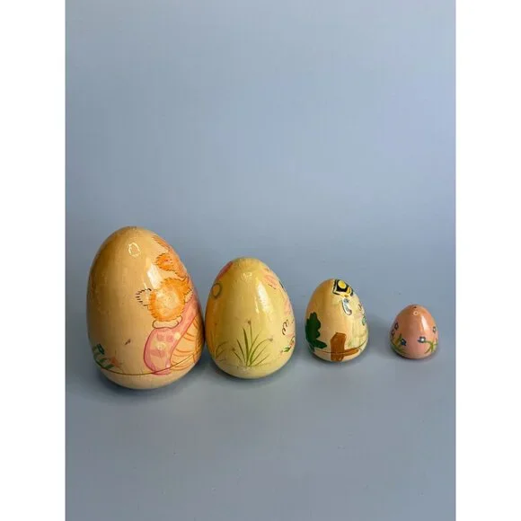 Hand-Painted Wooden Nesting Egg Set With Adorable Animal Designs & Pastel Colors - Picture 4 of 6